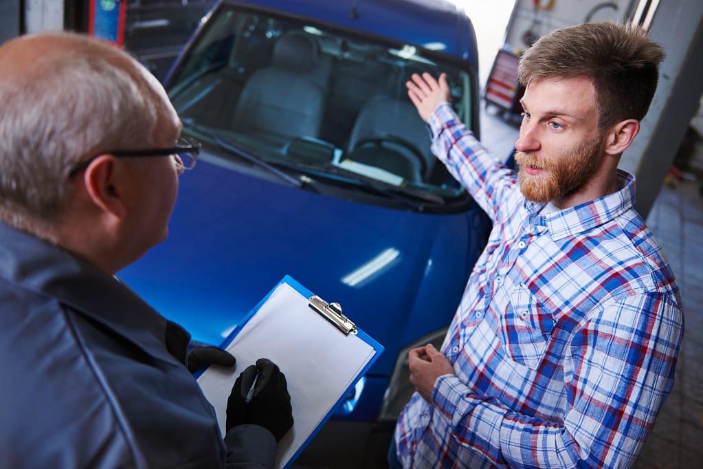 Man selling scrap car stress-free with Eco Recycle service, smooth process explained by expert.