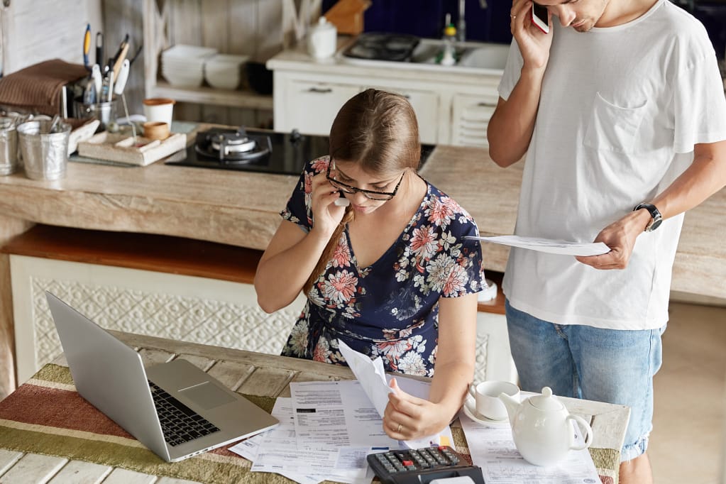 Busy Family Managing Finances, Highlighting Time and Money Savings from Scrap Services